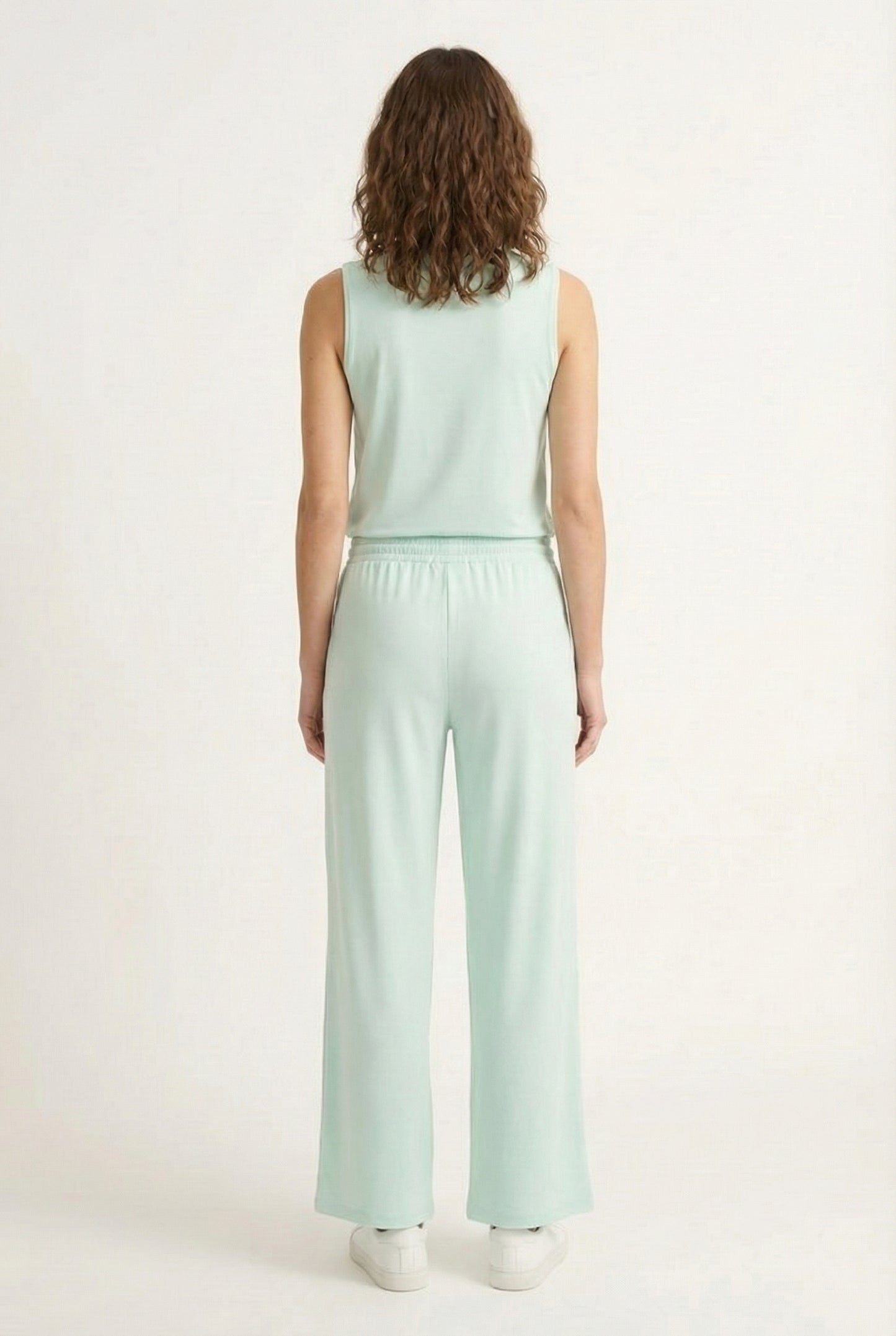 LOHNR Elevé Set in Celadon. A premium sleeveless faux-collar top and wide-leg pant matching set made from a smooth, wrinkle-resistant fabric.