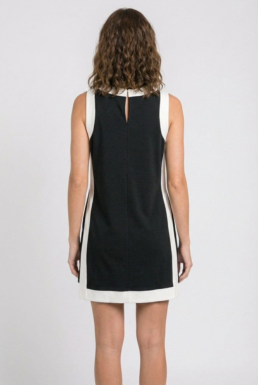 Model wearing the Lohnr Game Day Set in Black, a 100% cotton two-piece outfit featuring hidden shorts with pockets.