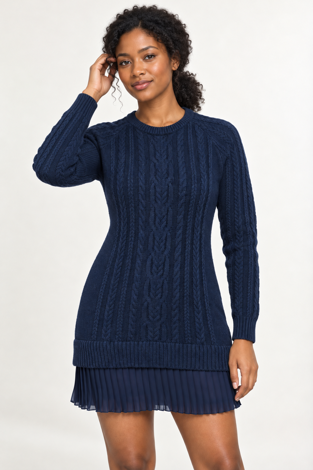 Woman wearing a cable-knit mini dress with a pleated hem in Midnight Navy, front view #1E2840