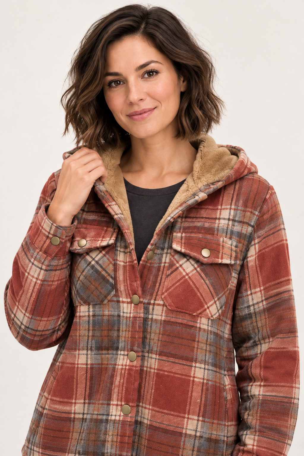 LOHNR Alder Hooded Shacket in Rust, portrait view showing plaid fabric, snap fastening, flap chest pockets and tan/camel hood lining.