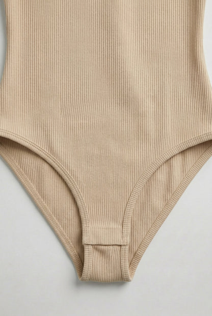 Model wearing an Almond beige square neck one-piece swimsuit