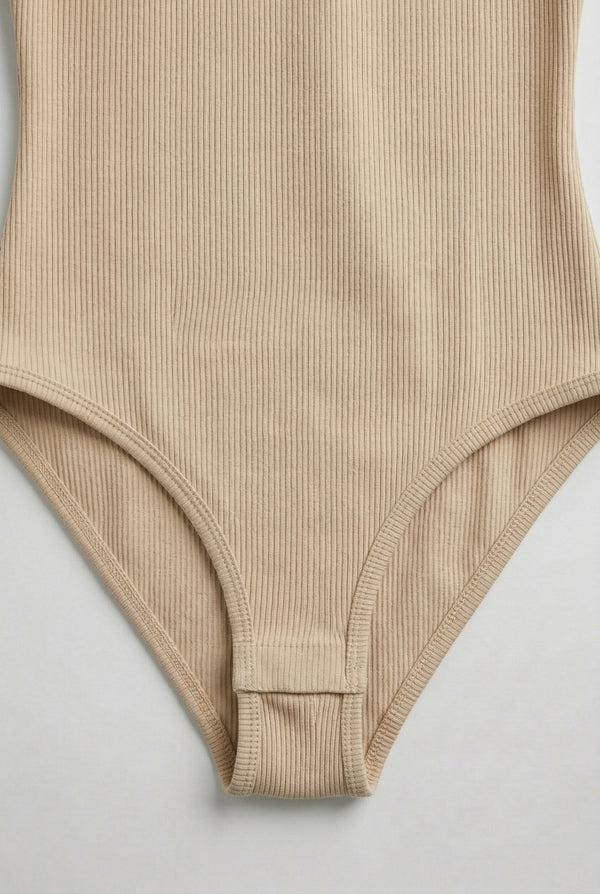 Model wearing an Almond beige square neck one-piece swimsuit