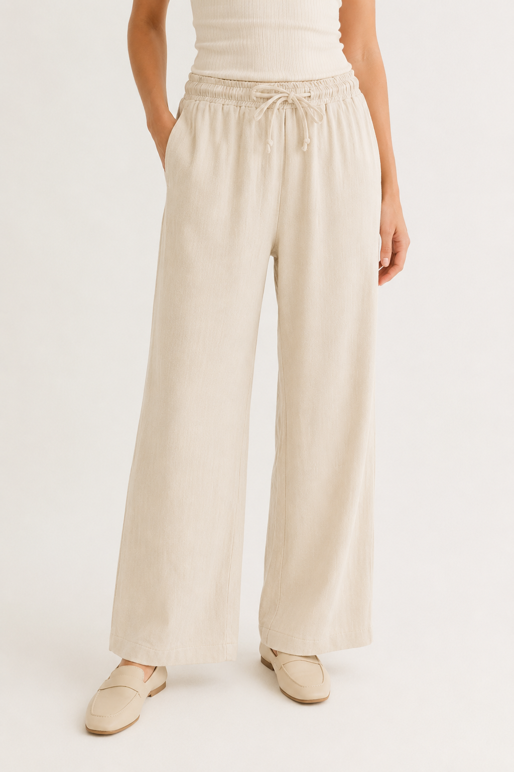 Woman wearing premium minimalist wide leg lounge pants