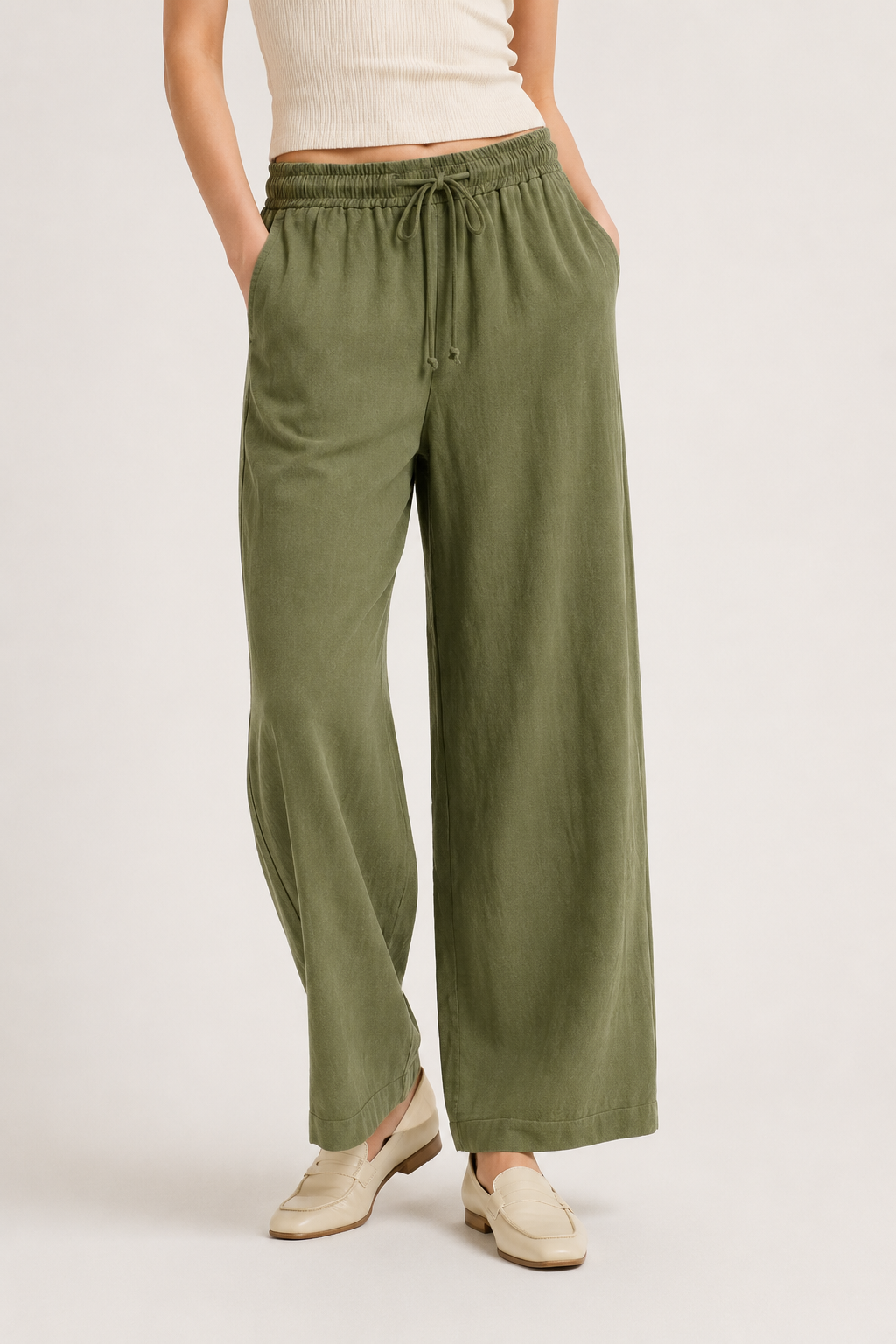 Woman wearing premium minimalist wide leg lounge pants