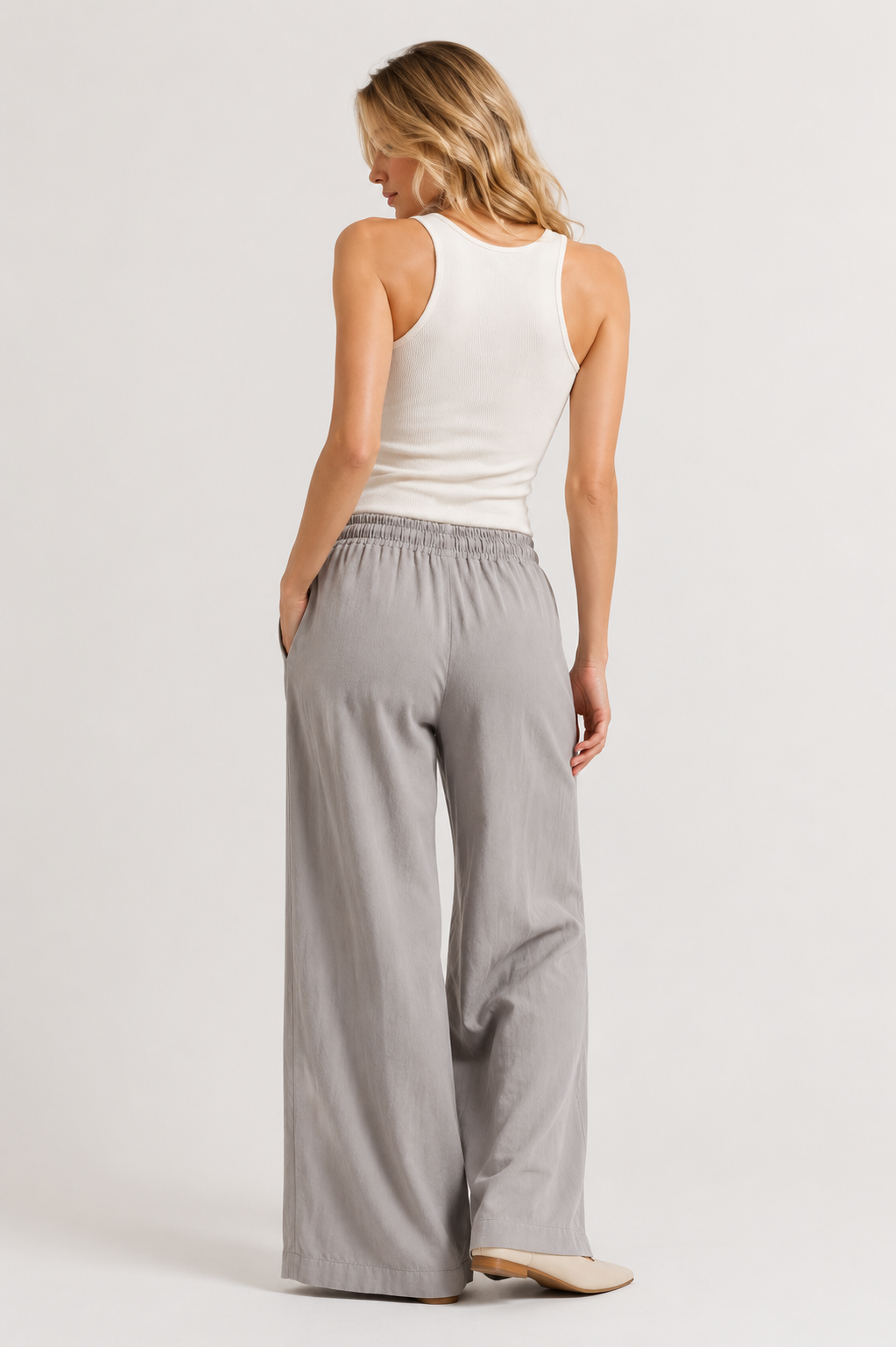 Woman wearing premium minimalist wide leg lounge pants