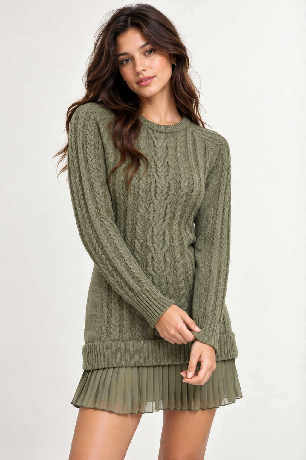 Woman wearing a cable-knit mini dress with a pleated hem in Sage Grove, front view #817D64