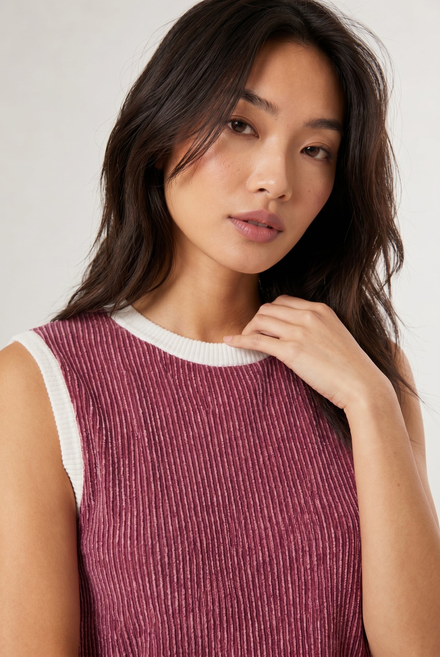 LOHNR Bound Rib Set in Maroon. A structured soft pink sleeveless knit top and matching asymmetric skirt, finished with precision contrast white binding.