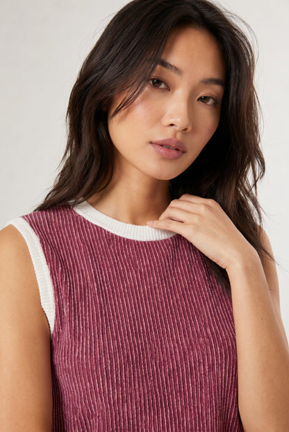 LOHNR Bound Rib Set in Maroon. A structured soft pink sleeveless knit top and matching asymmetric skirt, finished with precision contrast white binding.