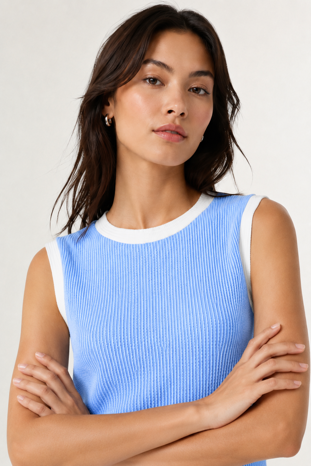 LOHNR Bound Rib Set in Sky. A structured light blue sleeveless knit top and matching asymmetric skirt, finished with precision contrast white binding.