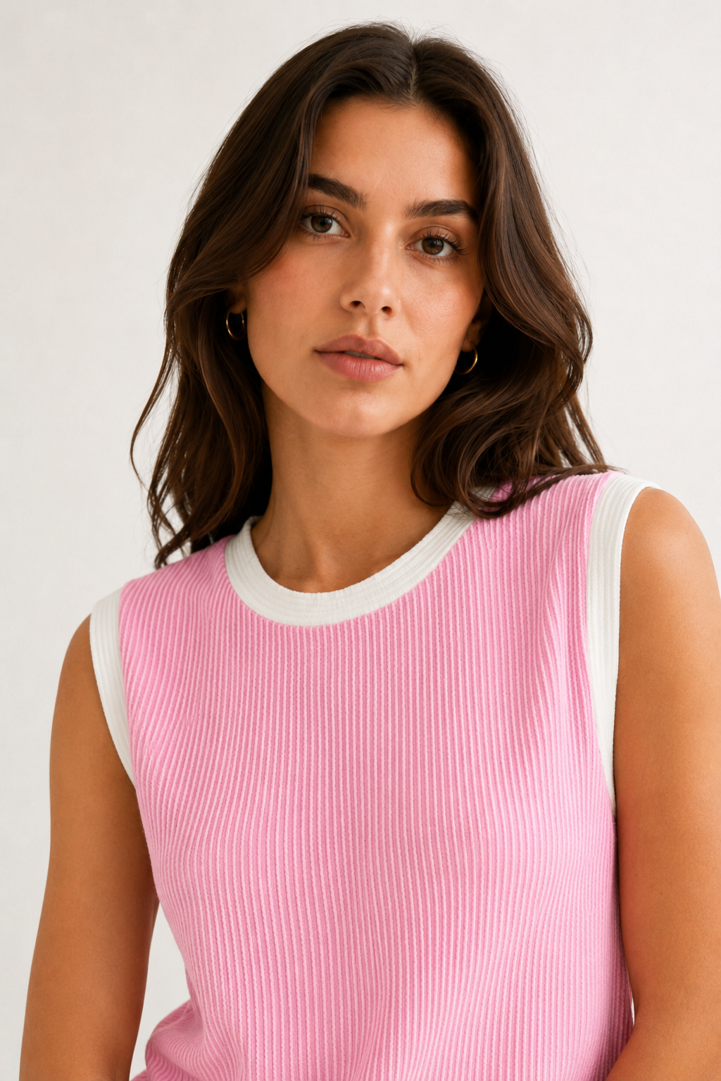 LOHNR Bound Rib Set in Sorbet. A structured soft pink sleeveless knit top and matching asymmetric skirt, finished with precision contrast white binding.
