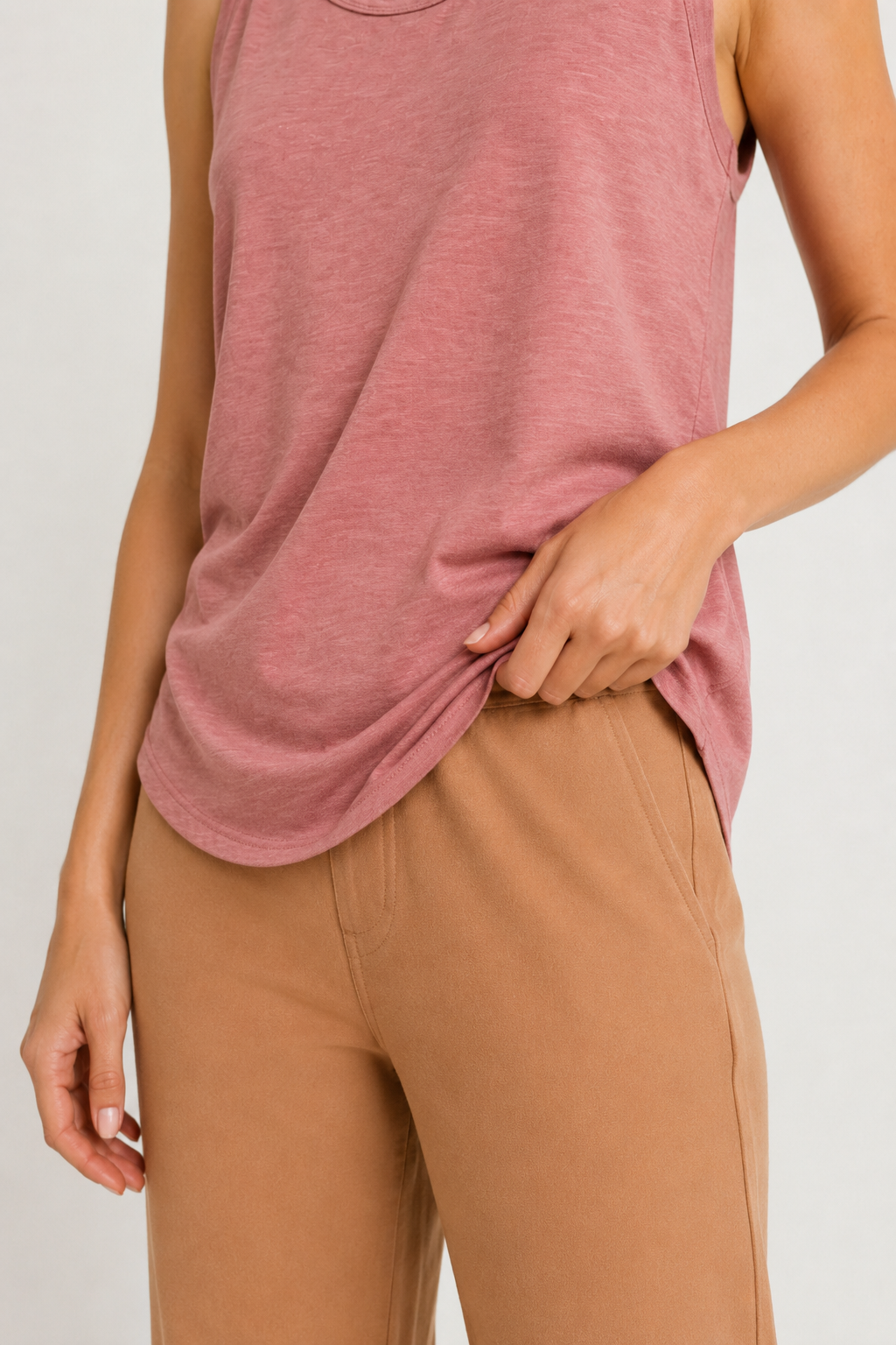 Woman wearing the Lohnr Zarah Tank with a scoop neck and effortless fit