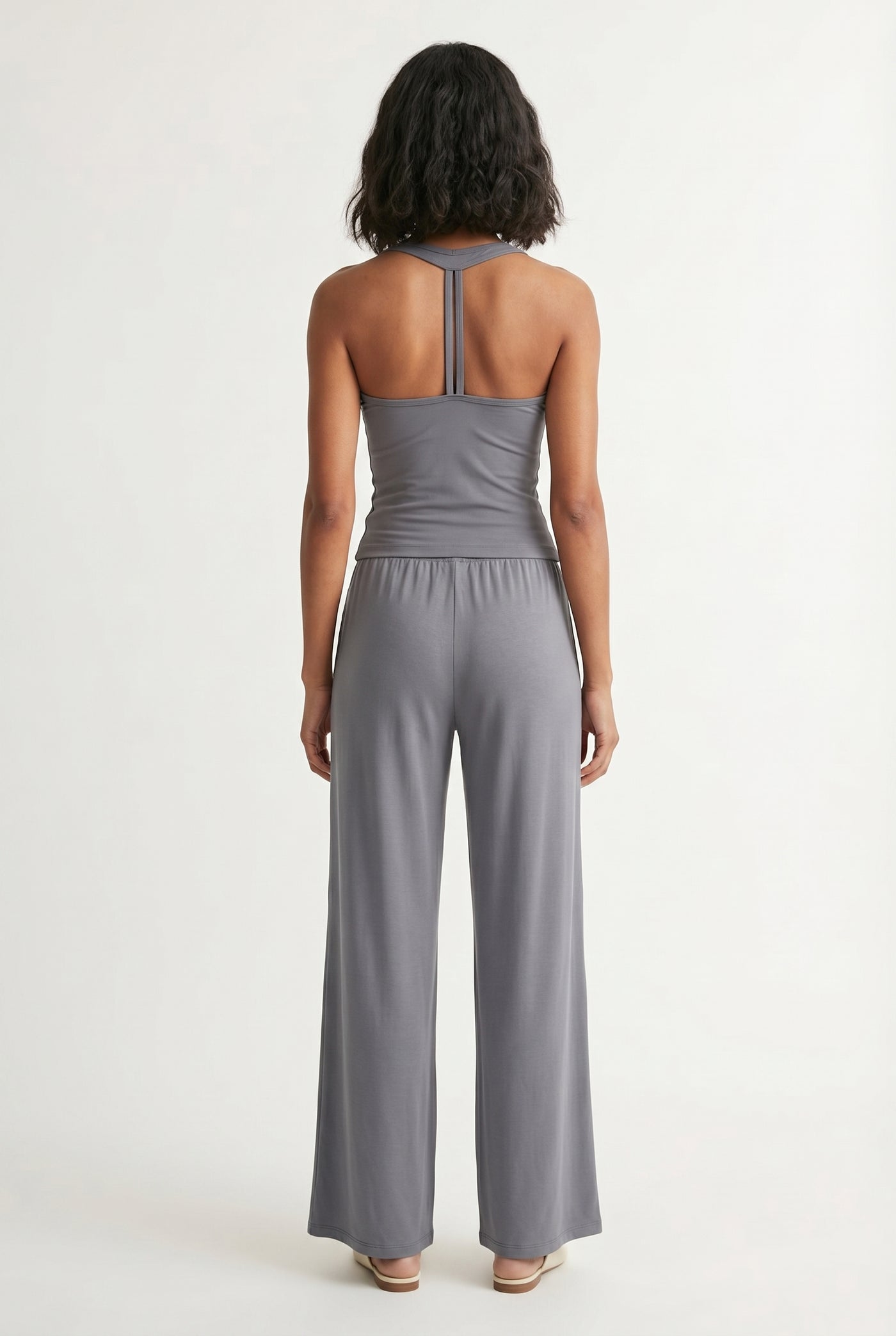 Ashen grey two-piece lounge set with wide leg pants and fitted tank top