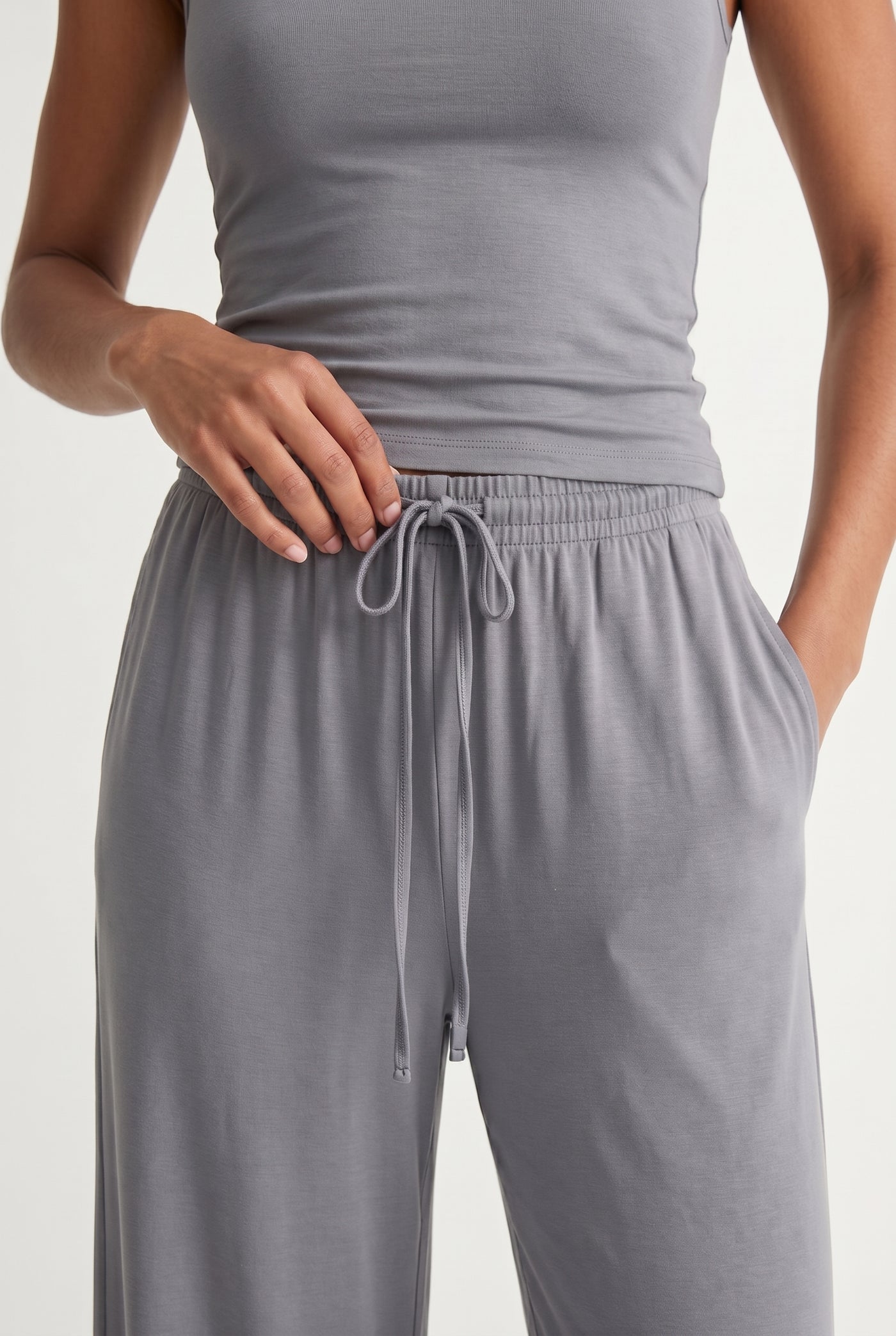 Ashen grey two-piece lounge set with wide leg pants and fitted tank top