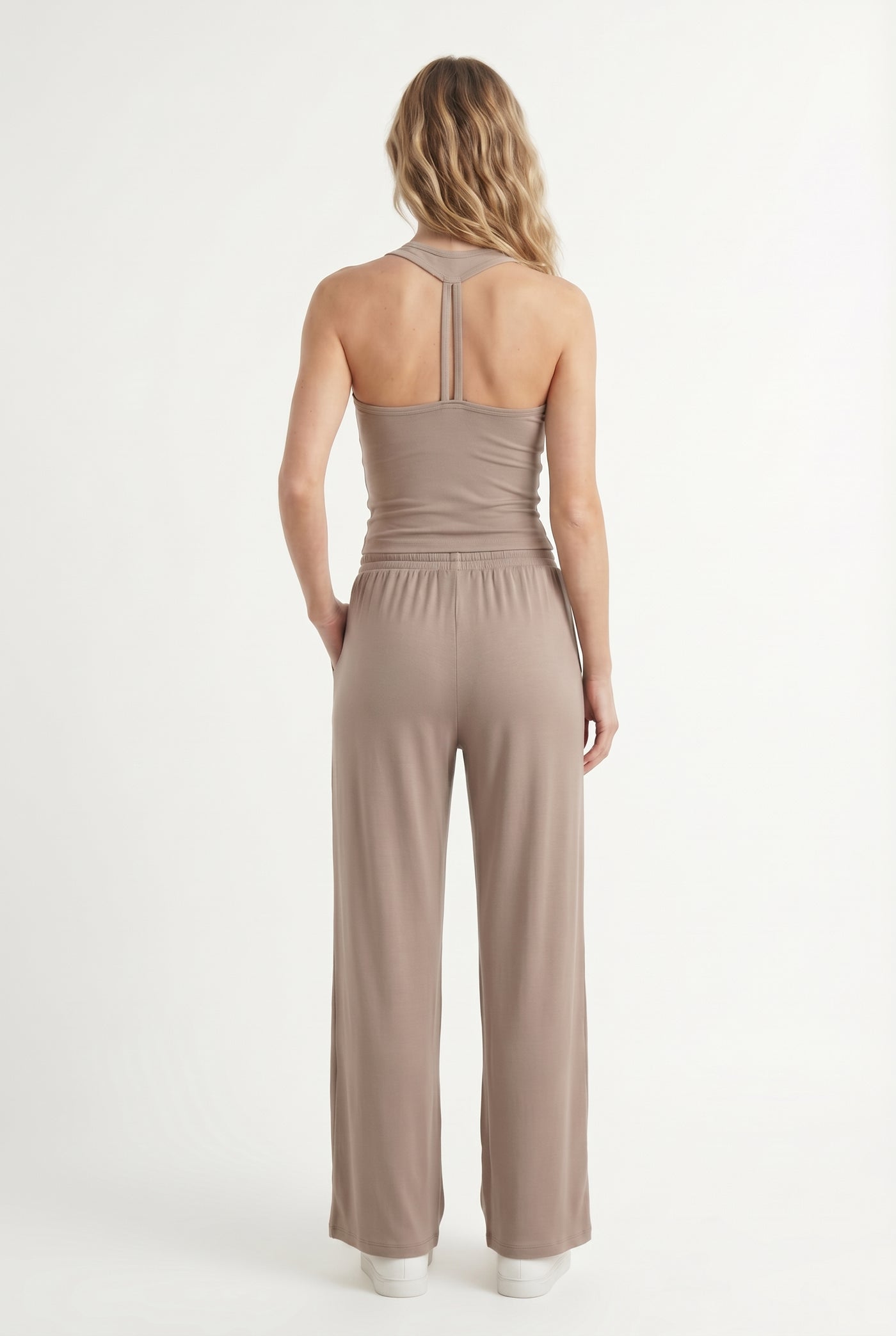 Dune beige two-piece lounge set with wide leg pants and fitted tank top