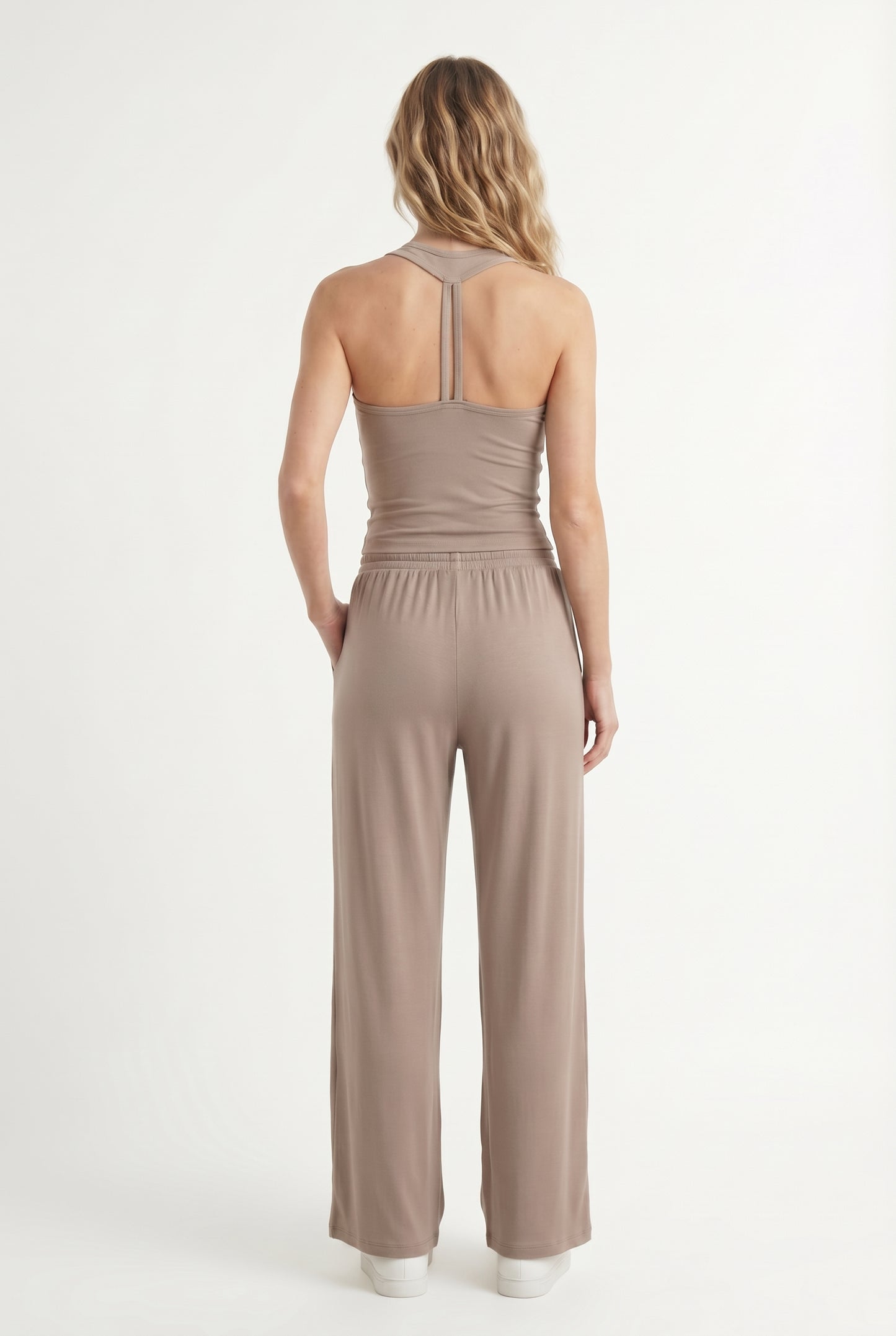 Dune beige two-piece lounge set with wide leg pants and fitted tank top