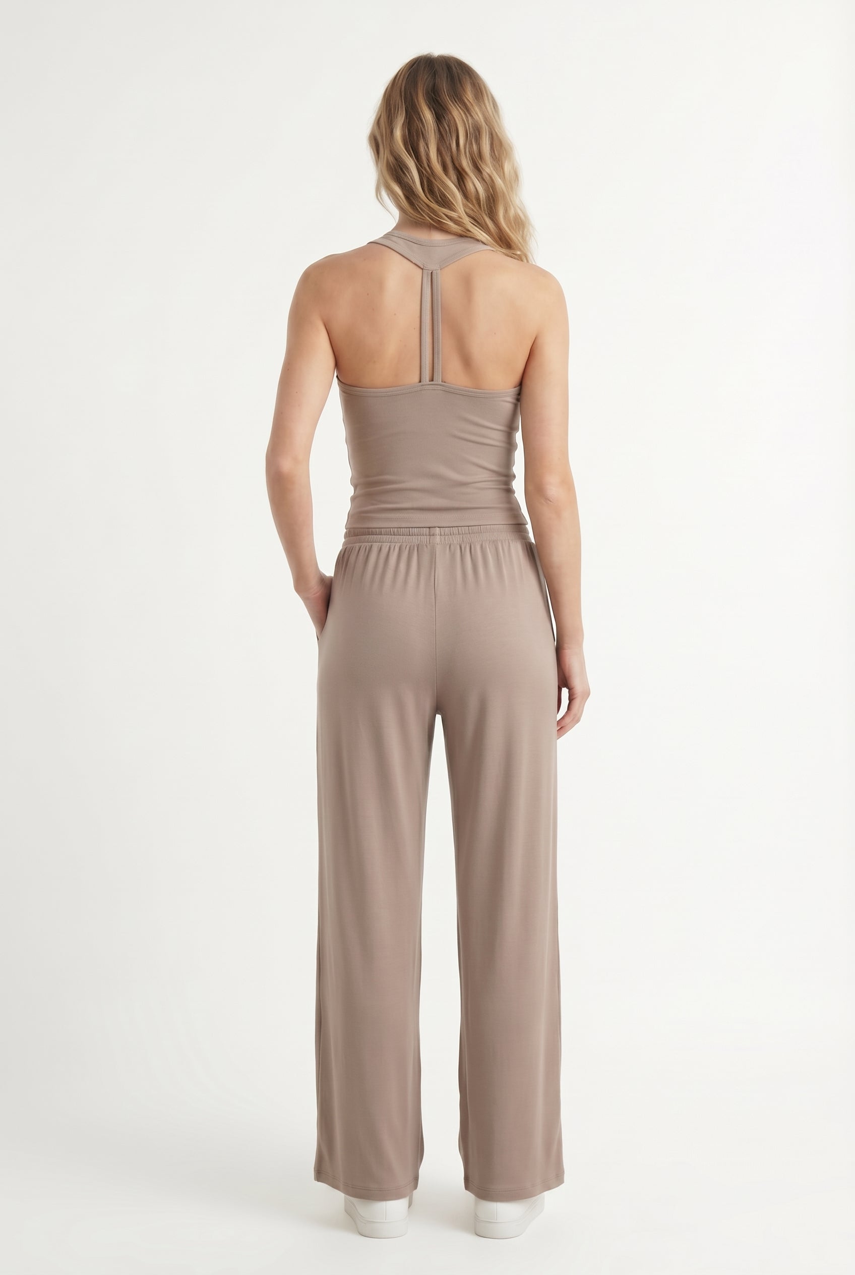 Dune beige two-piece lounge set with wide leg pants and fitted tank top