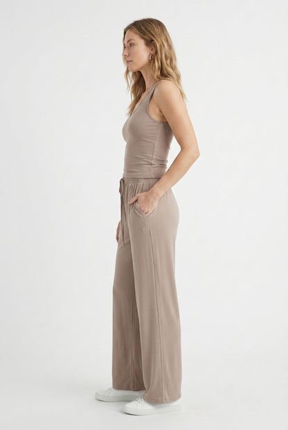 Dune beige two-piece lounge set with wide leg pants and fitted tank top