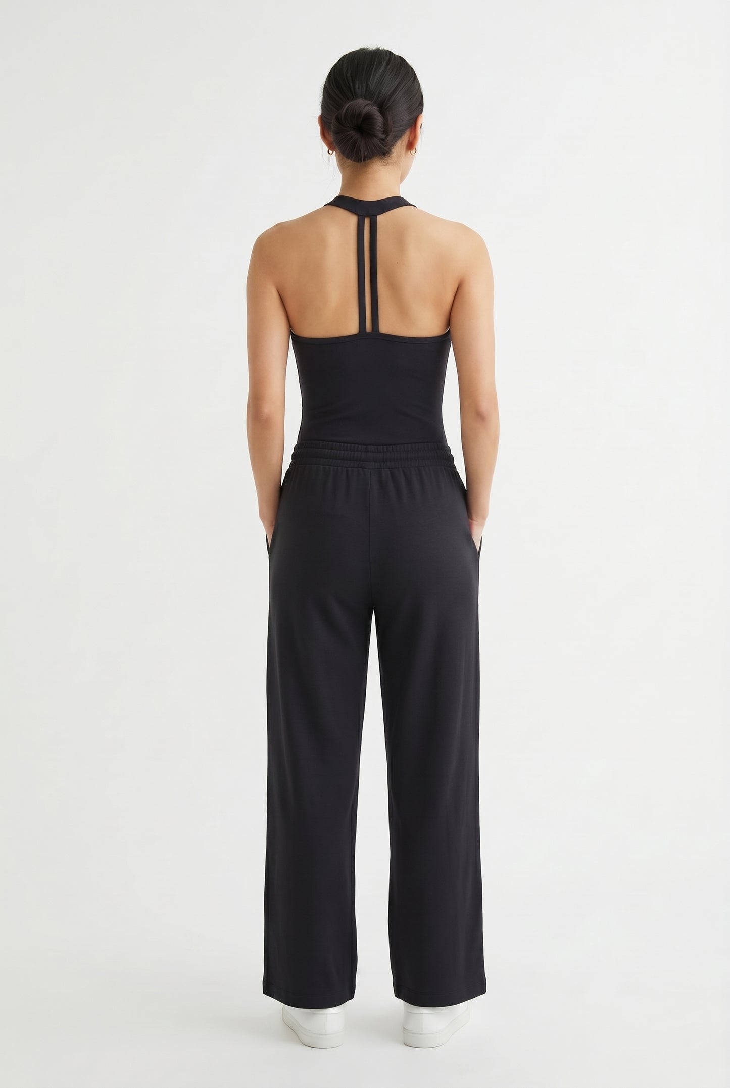 Onyx black two-piece lounge set with wide leg pants and fitted tank top