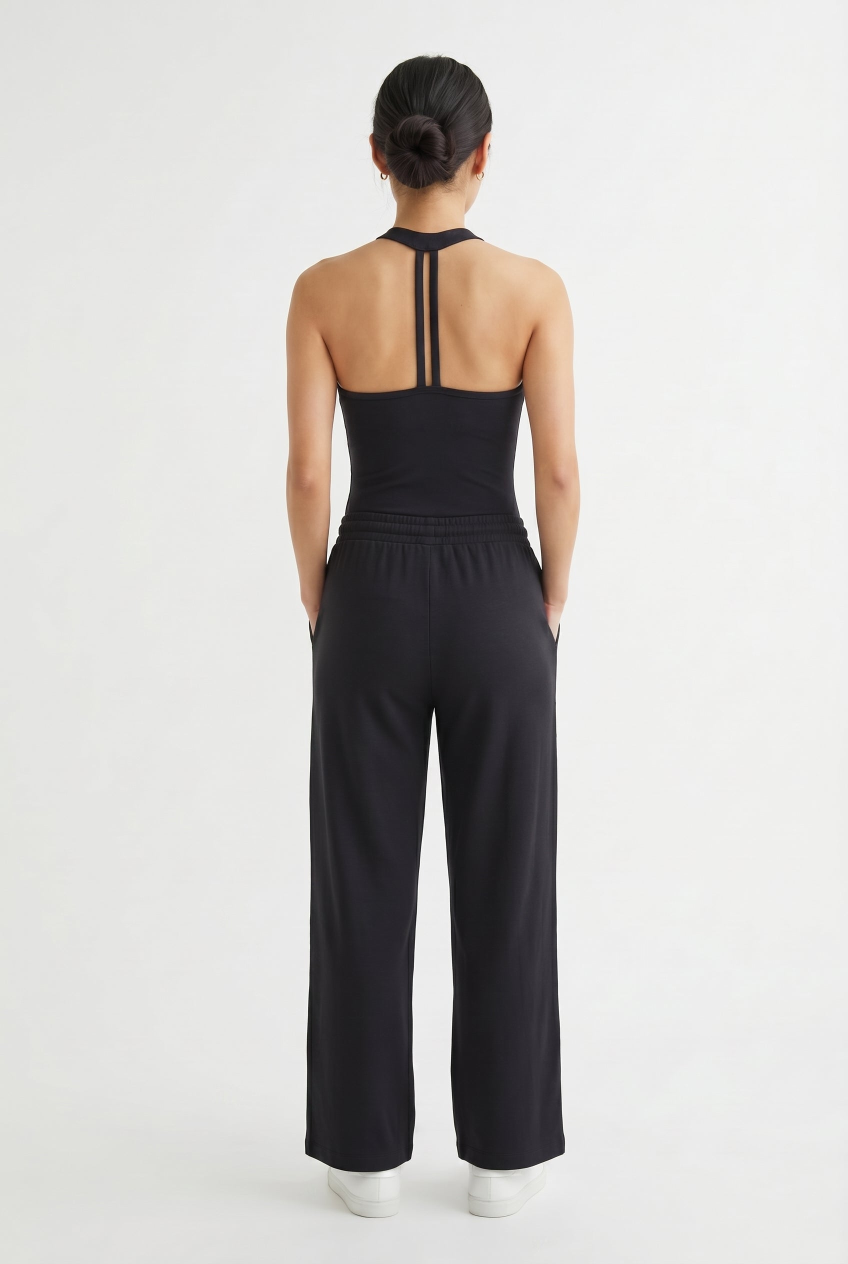Onyx black two-piece lounge set with wide leg pants and fitted tank top