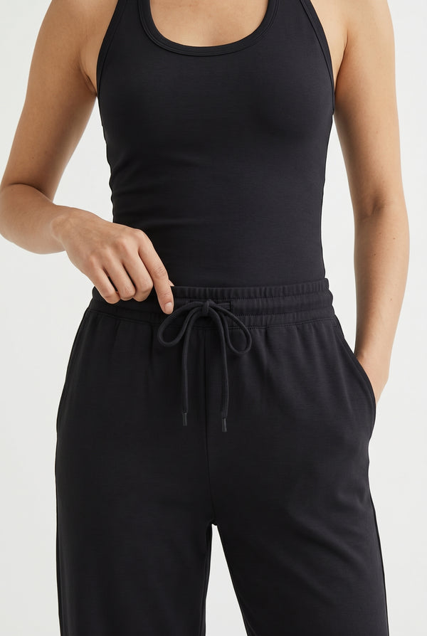 Onyx black two-piece lounge set with wide leg pants and fitted tank top