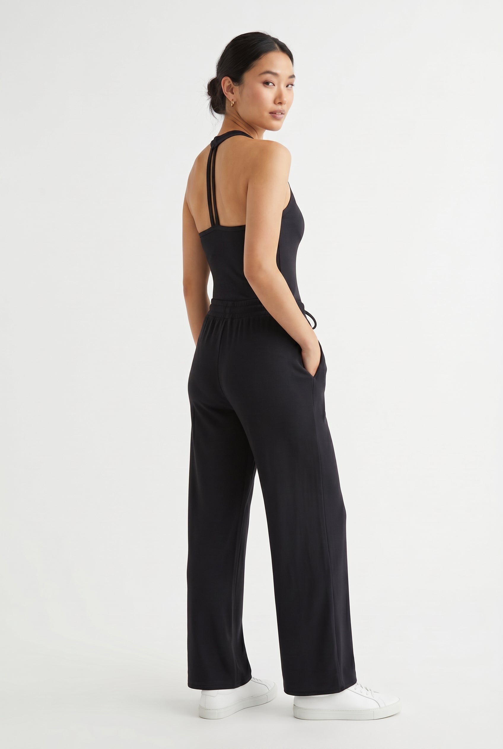Onyx black two-piece lounge set with wide leg pants and fitted tank top