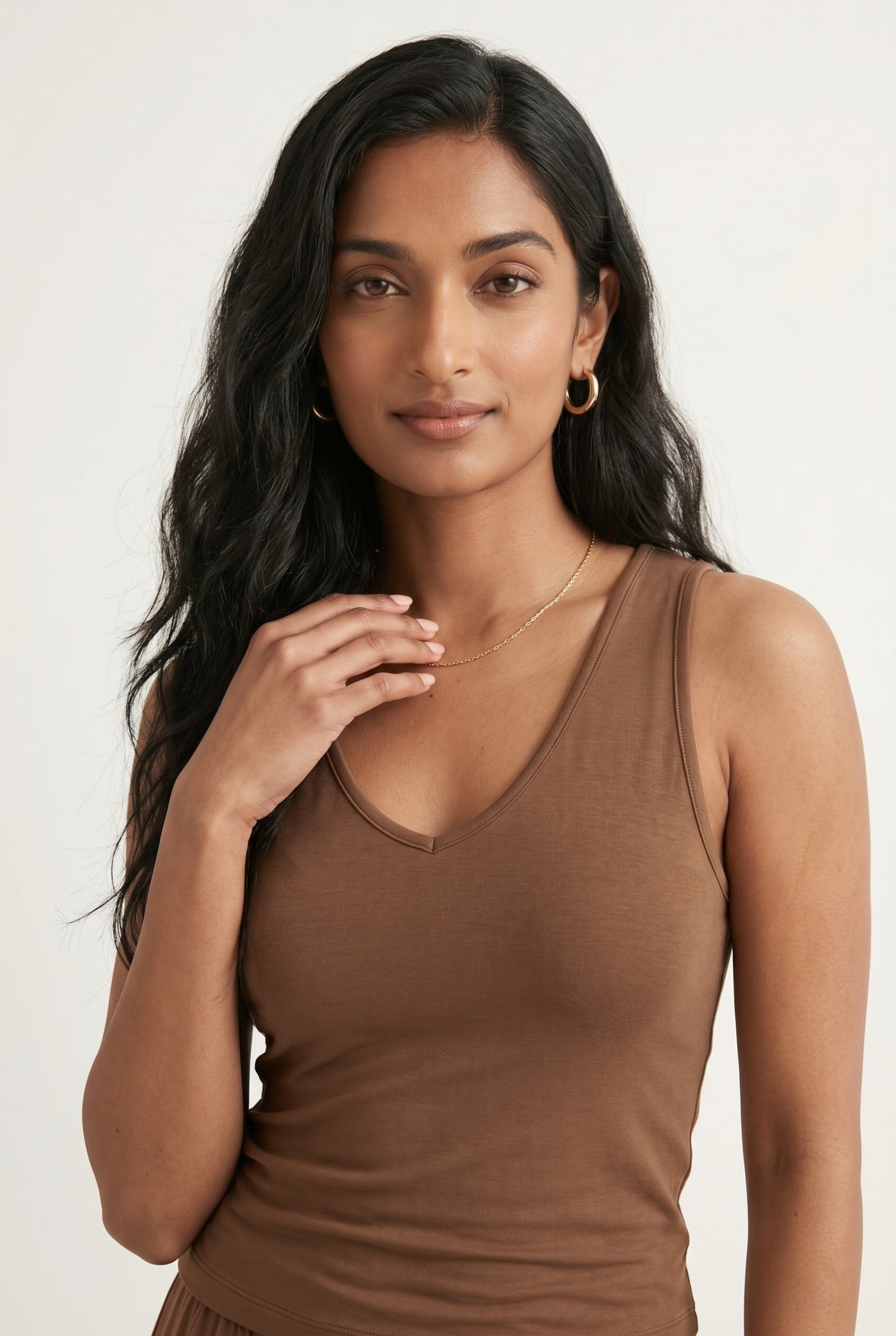 Rich mocha brown two-piece lounge set with wide leg pants and fitted tank top