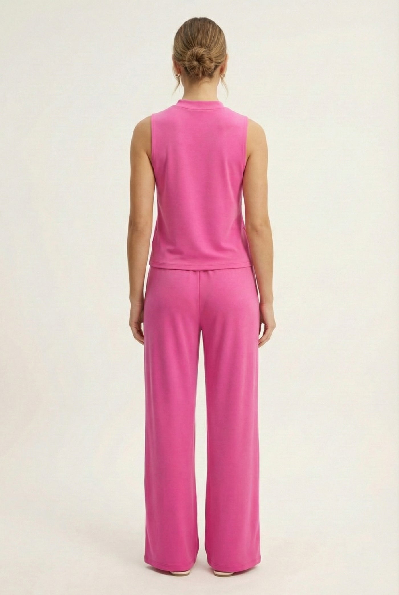 LOHNR Elevé Set in Azalea. A premium sleeveless faux-collar top and wide-leg pant matching set made from a smooth, wrinkle-resistant fabric.