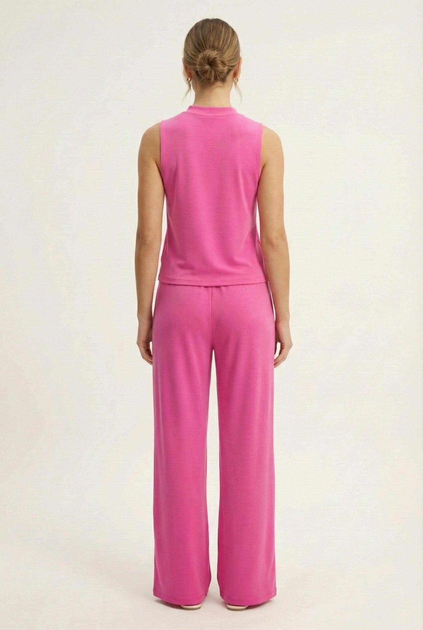 LOHNR Elevé Set in Azalea. A premium sleeveless faux-collar top and wide-leg pant matching set made from a smooth, wrinkle-resistant fabric.
