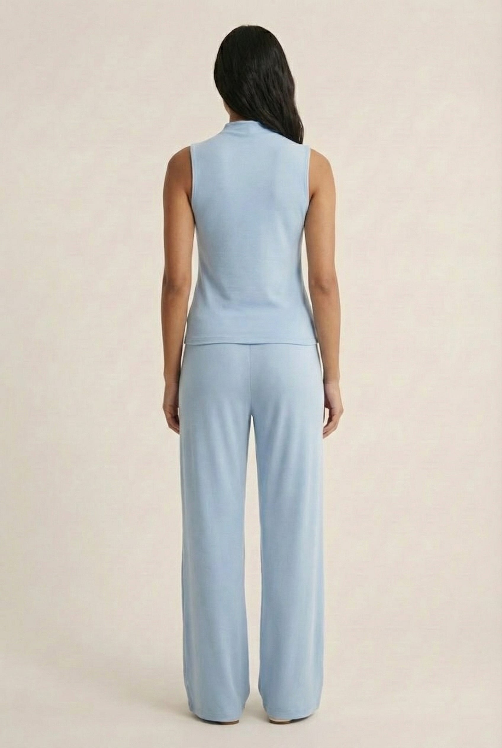 LOHNR Elevé Set in Blue Haze. A premium sleeveless faux-collar top and wide-leg pant matching set made from a smooth, wrinkle-resistant fabric.