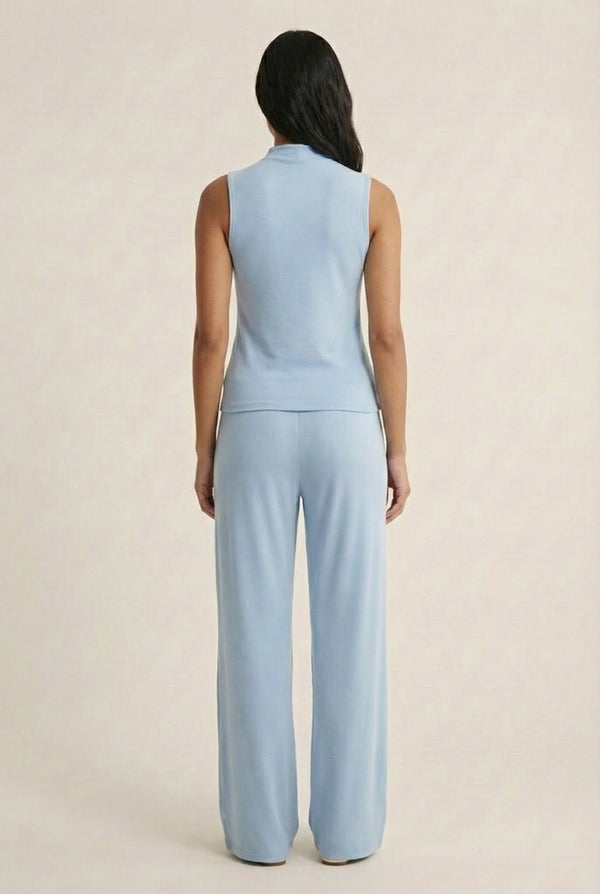 LOHNR Elevé Set in Blue Haze. A premium sleeveless faux-collar top and wide-leg pant matching set made from a smooth, wrinkle-resistant fabric.