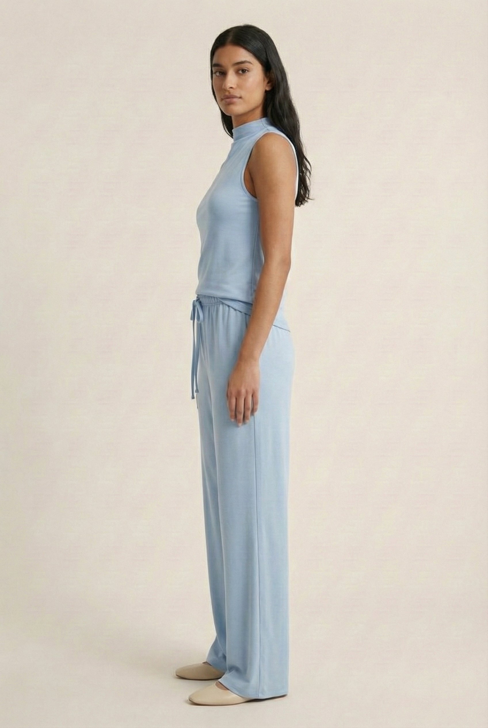 LOHNR Elevé Set in Blue Haze. A premium sleeveless faux-collar top and wide-leg pant matching set made from a smooth, wrinkle-resistant fabric.