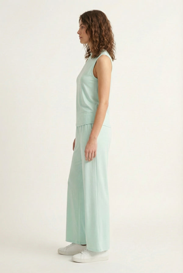 LOHNR Elevé Set in Celadon. A premium sleeveless faux-collar top and wide-leg pant matching set made from a smooth, wrinkle-resistant fabric.