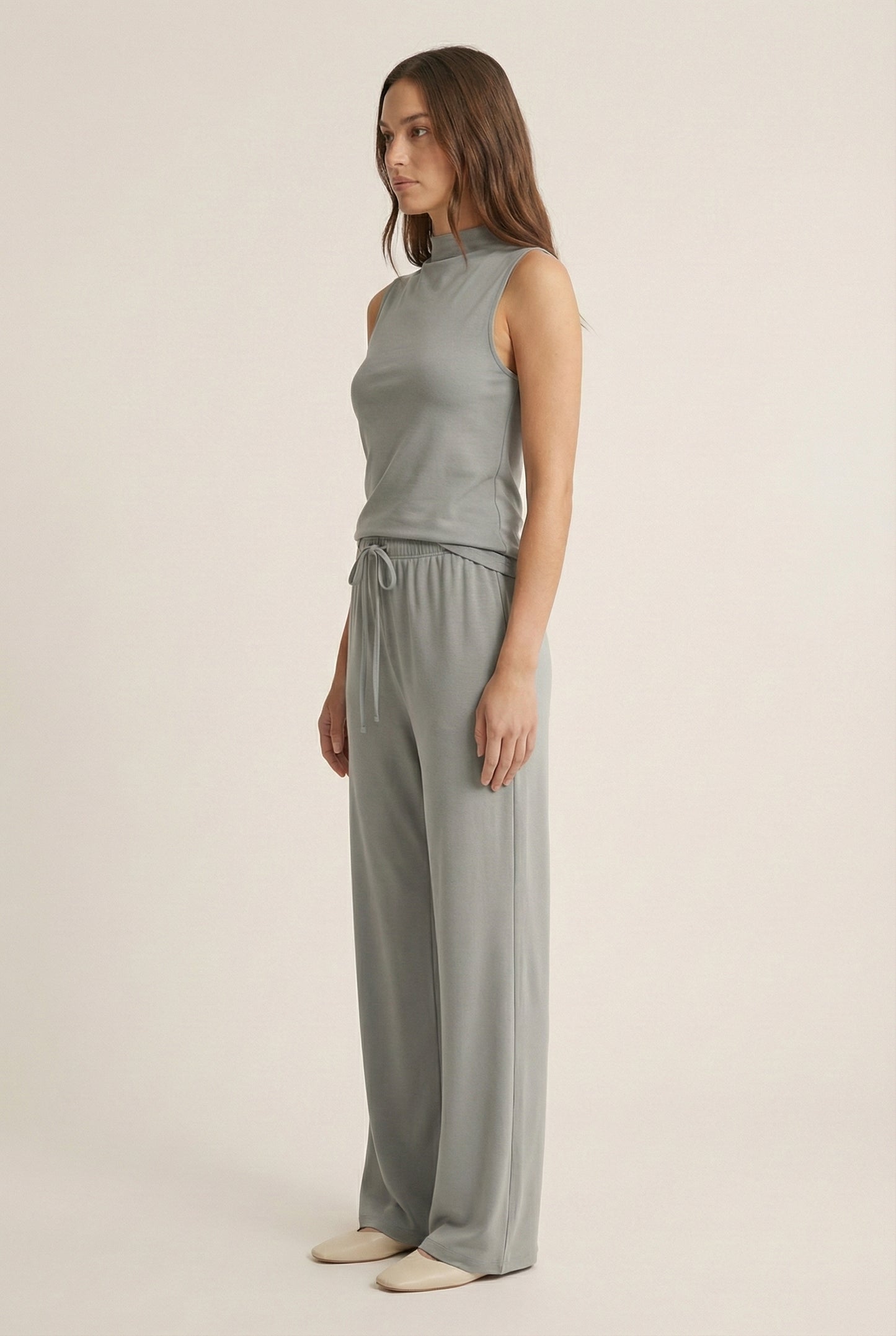 LOHNR Elevé Set in Mushroom Grey. A premium sleeveless faux-collar top and wide-leg pant matching set made from a smooth, wrinkle-resistant fabric.
