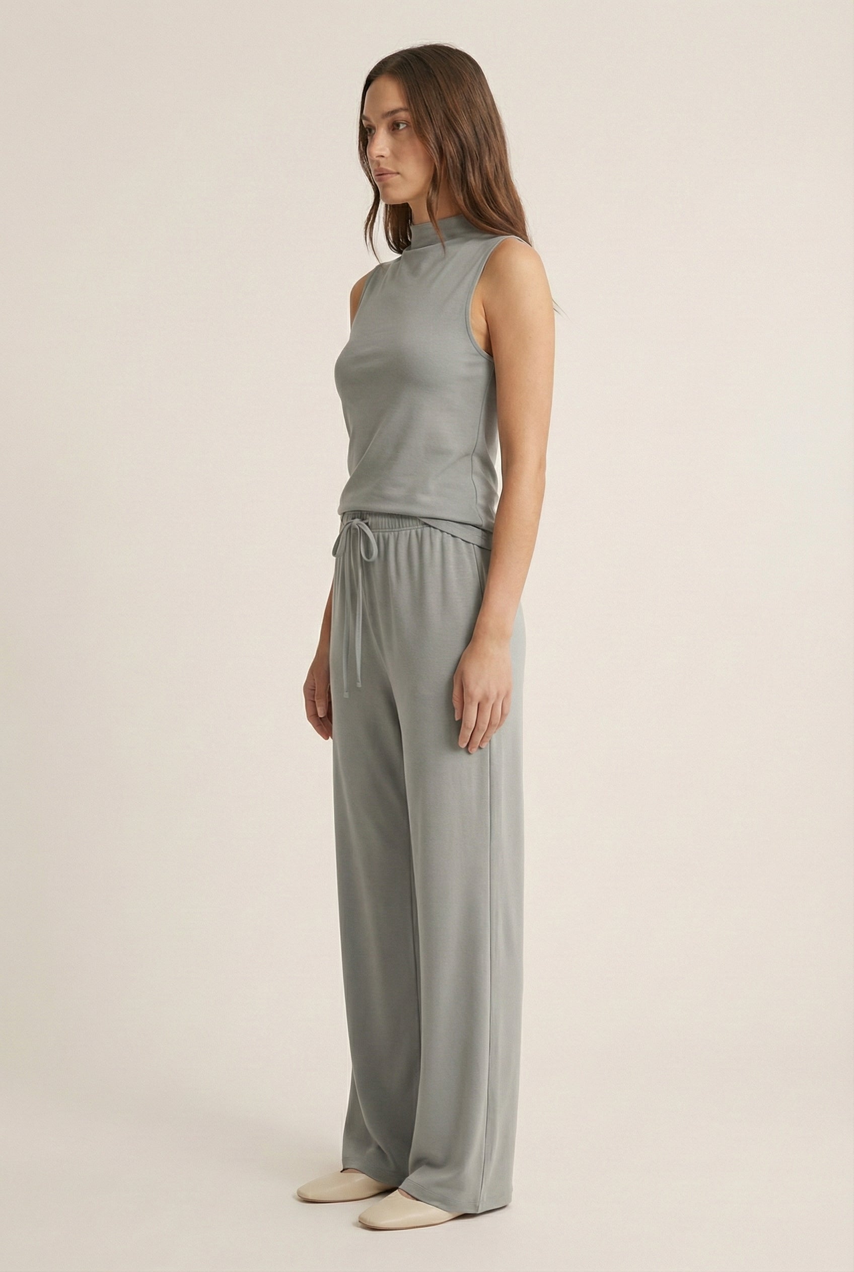 LOHNR Elevé Set in Mushroom Grey. A premium sleeveless faux-collar top and wide-leg pant matching set made from a smooth, wrinkle-resistant fabric.