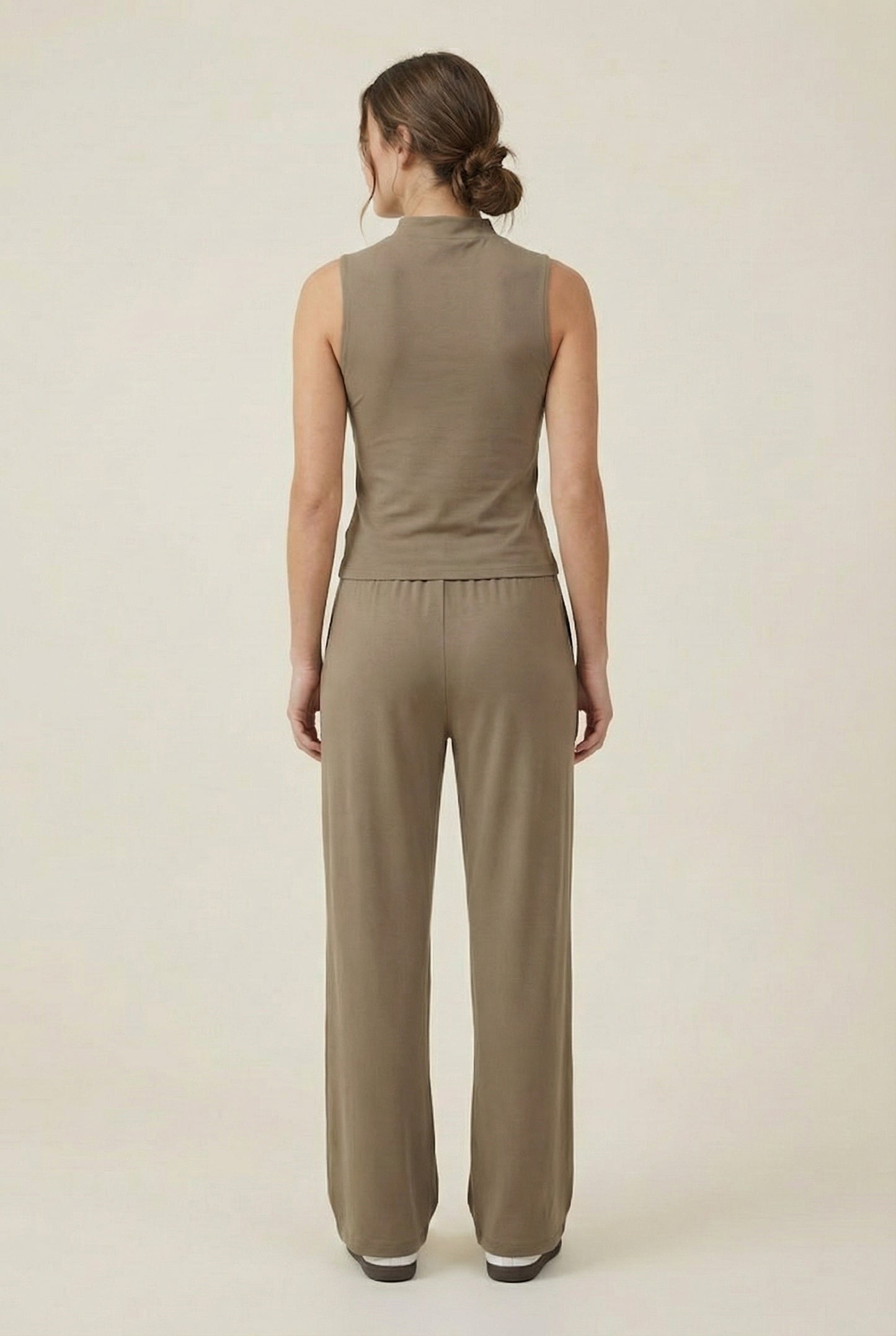 LOHNR Elevé Set in Warm Taupe. A premium sleeveless faux-collar top and wide-leg pant matching set made from a smooth, wrinkle-resistant fabric.