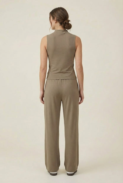LOHNR Elevé Set in Warm Taupe. A premium sleeveless faux-collar top and wide-leg pant matching set made from a smooth, wrinkle-resistant fabric.