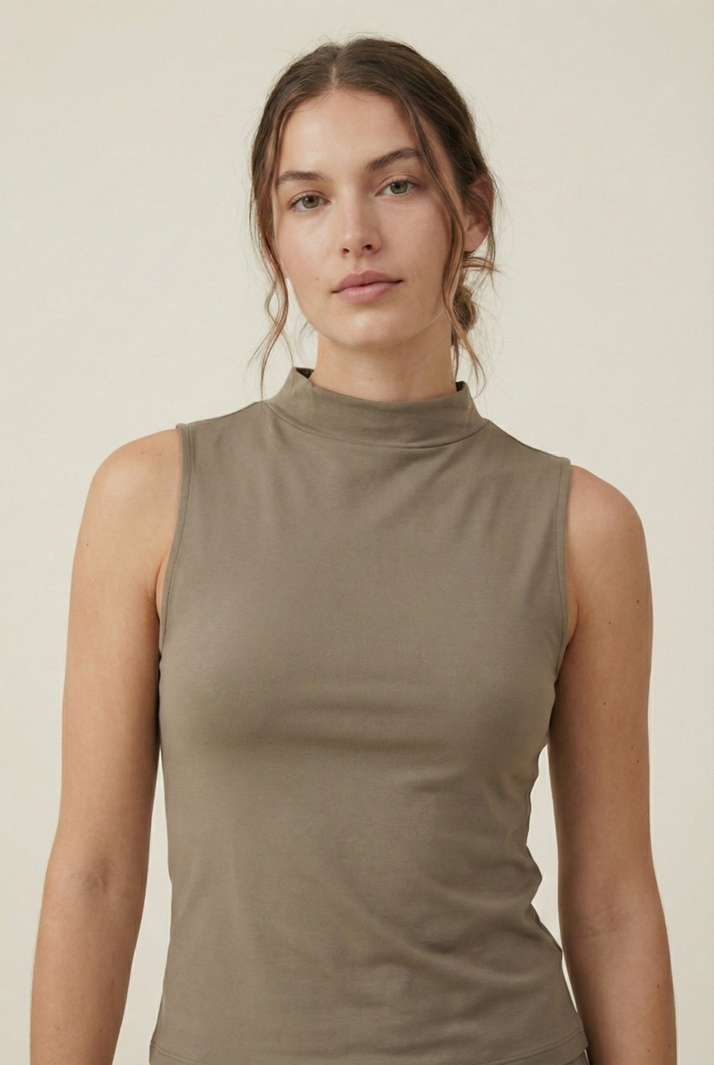 LOHNR Elevé Set in Warm Taupe. A premium sleeveless faux-collar top and wide-leg pant matching set made from a smooth, wrinkle-resistant fabric.