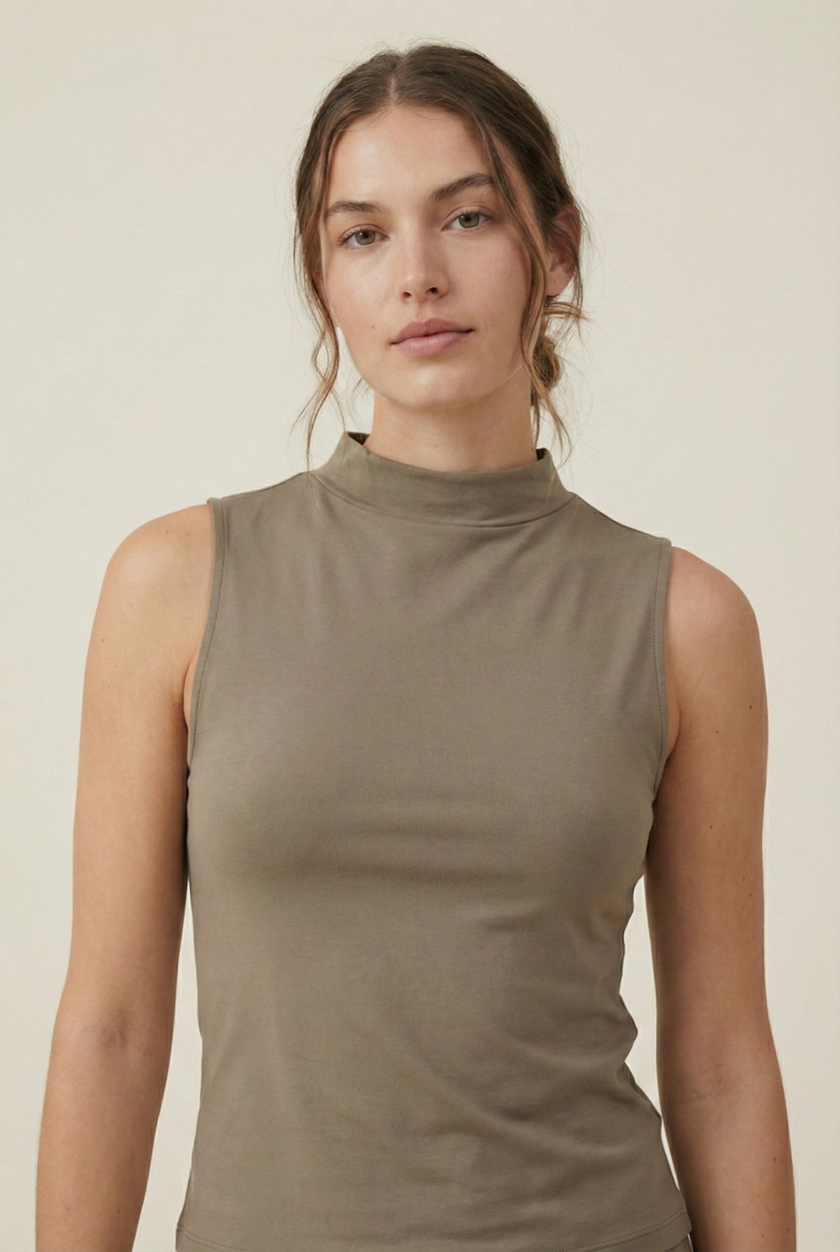LOHNR Elevé Set in Warm Taupe. A premium sleeveless faux-collar top and wide-leg pant matching set made from a smooth, wrinkle-resistant fabric.