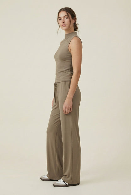 LOHNR Elevé Set in Warm Taupe. A premium sleeveless faux-collar top and wide-leg pant matching set made from a smooth, wrinkle-resistant fabric.
