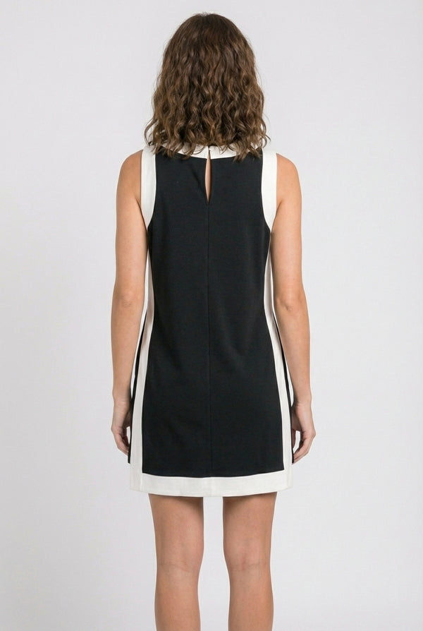 Model wearing the Lohnr Game Day Set in Black, a 100% cotton two-piece outfit featuring hidden shorts with pockets.