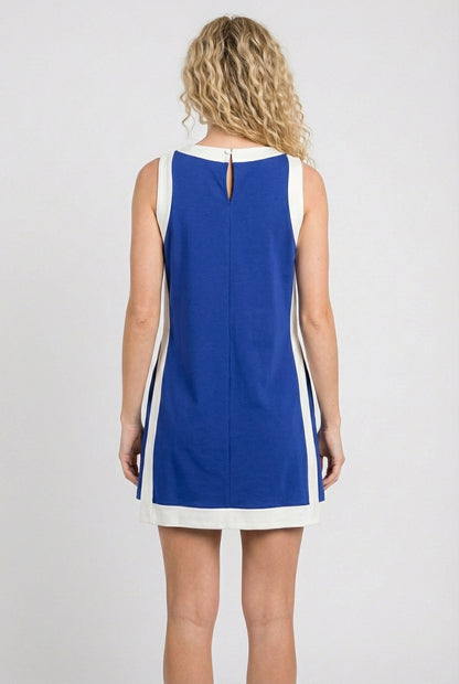 Model wearing the Lohnr Game Day Set in Blue, a 100% cotton two-piece outfit featuring hidden shorts with pockets.