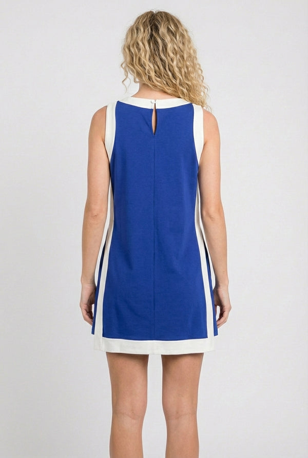 Model wearing the Lohnr Game Day Set in Blue, a 100% cotton two-piece outfit featuring hidden shorts with pockets.