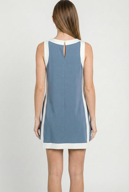 Model wearing the Lohnr Game Day Set in Light Blue, a 100% cotton two-piece outfit featuring hidden shorts with pockets.