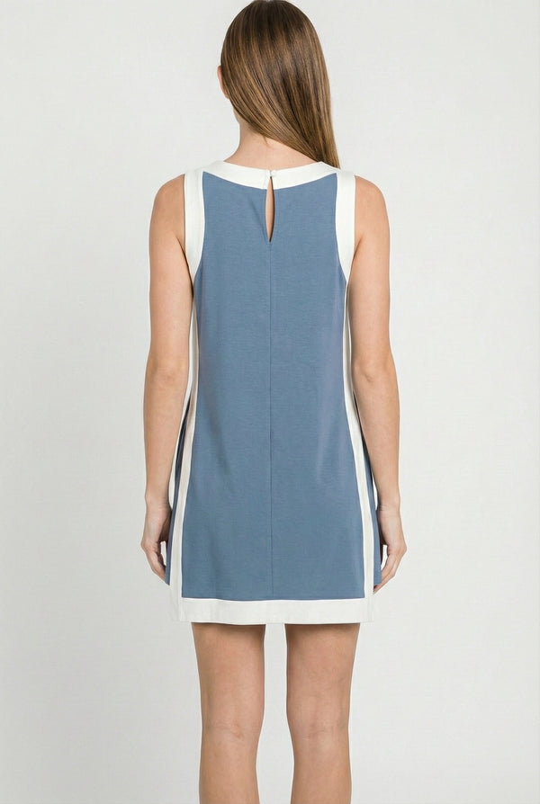 Model wearing the Lohnr Game Day Set in Light Blue, a 100% cotton two-piece outfit featuring hidden shorts with pockets.