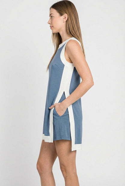 Model wearing the Lohnr Game Day Set in Light Blue, a 100% cotton two-piece outfit featuring hidden shorts with pockets.