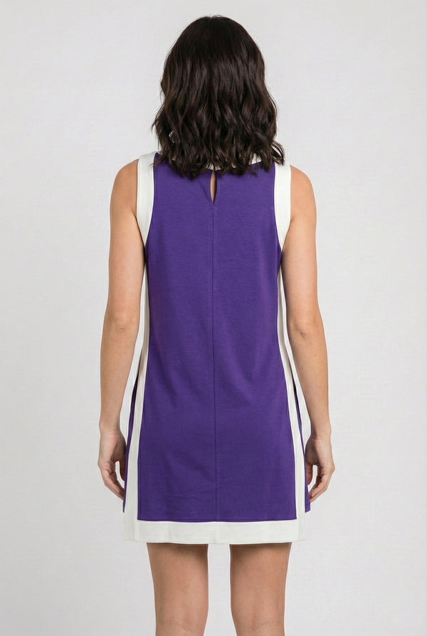 Model wearing the Lohnr Game Day Set in Purple, a 100% cotton two-piece outfit featuring hidden shorts with pockets.