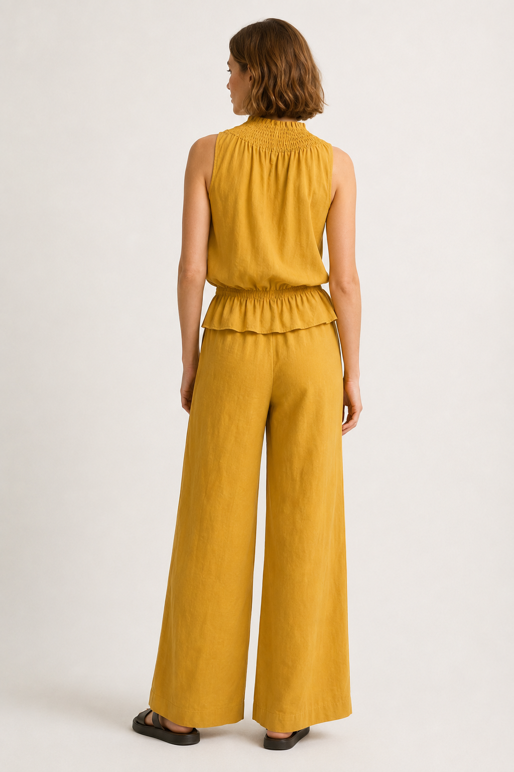 Lohnr Game Day Set in Saffron featuring a minimal sleeveless top and relaxed wide-leg trousers