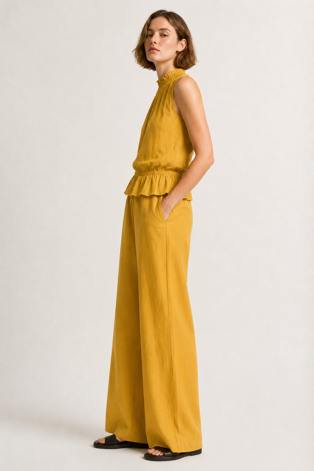 Lohnr Game Day Set in Saffron featuring a minimal sleeveless top and relaxed wide-leg trousers