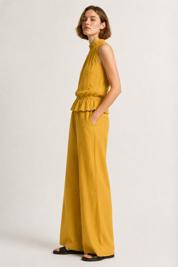 Lohnr Game Day Set in Saffron featuring a minimal sleeveless top and relaxed wide-leg trousers