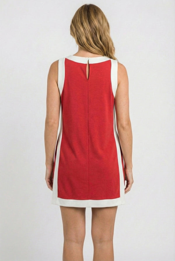 Model wearing the Lohnr Game Day Set in Scarlet, a 100% cotton two-piece outfit featuring hidden shorts with pockets.